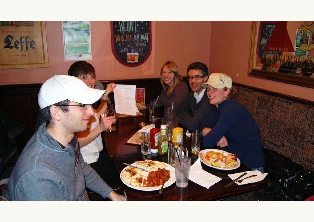 Original article photograph of friends taking part in a pub quiz