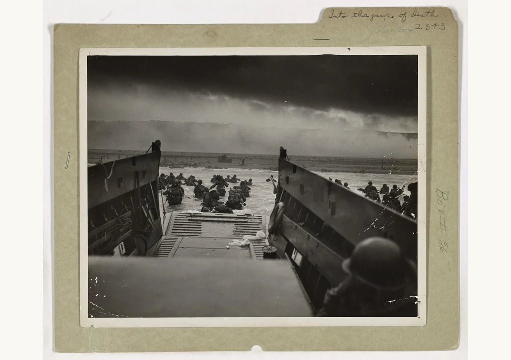 Archival photograph of troops landing in Normandy on June 6, 1944