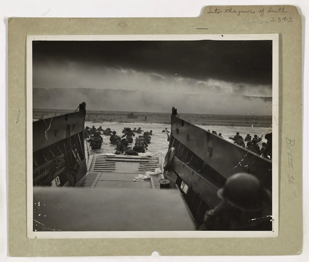 Archival photograph of troops landing in Normandy on June 6, 1944
